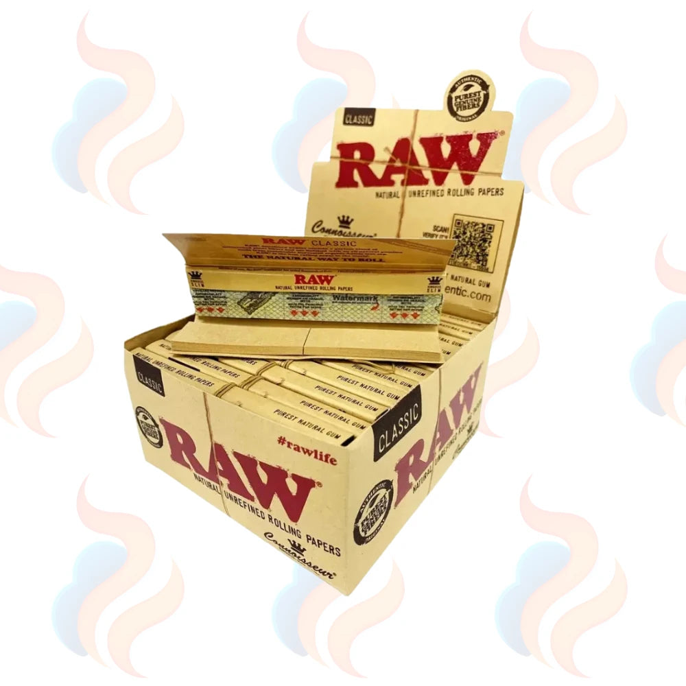 Open box of 24 Raw rolling papers and tips on a white background