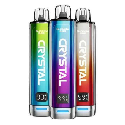 Three colorful vape devices labeled 'Crystal' on a white background