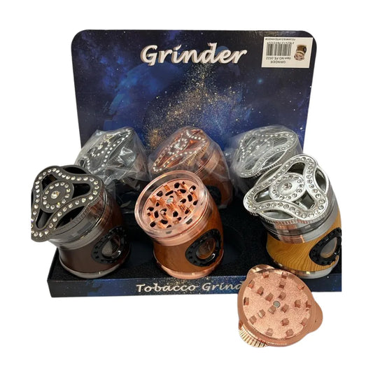 Set of fidget spinner tobacco grinders featuring wooden-style rustic finish with spinning lid tops