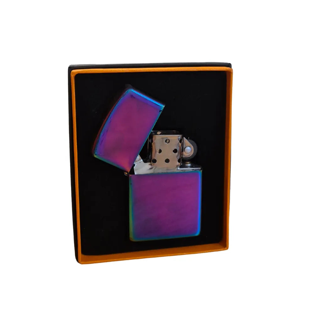 Chrome flip-top lighter with metallic accents in a black box on a white background