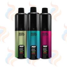Three IVG XL35 vape devices in green, blue, and pink on a white background with subtle smoke effects.