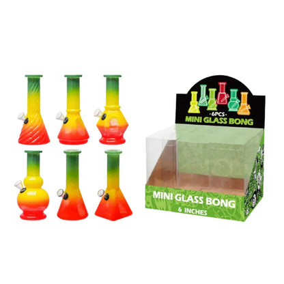 Set of colourful mini glass bongs with a packaging box on a white background
