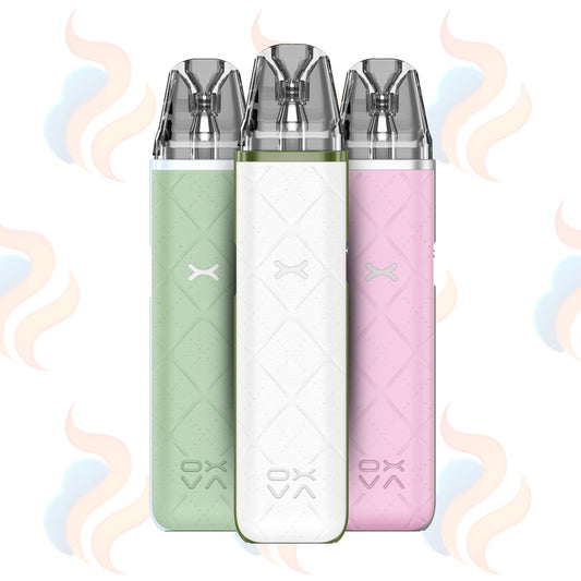 Three OXVA Xlim Go vape devices in green, white, and pink on a light background with subtle cloud graphics.
