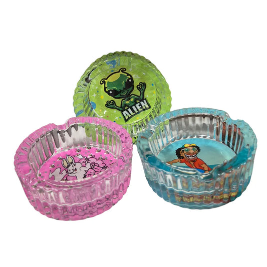 Three transparent-colourful ashtray bowls with cartoon designs on a white background