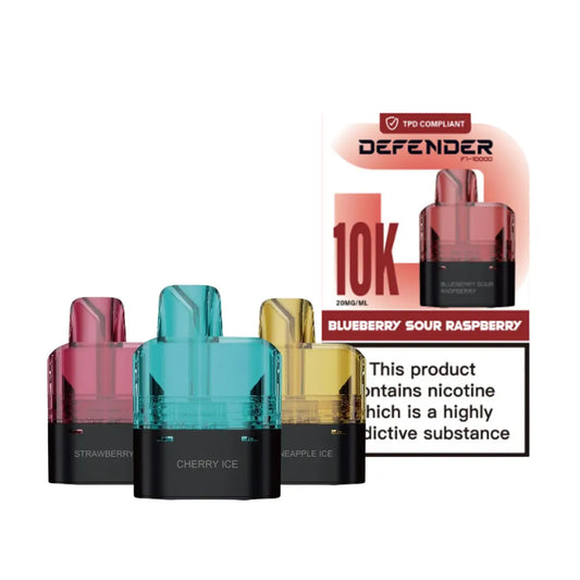 Vape pods with colorful transparent tanks and black bases, displayed with a 'Defender' packaging on a white background.