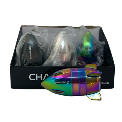 colourful rocket shaped 4-part grinder in front of packaging for a box of 6 grinders