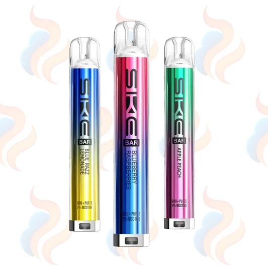 Three SKE vape bars in blue, pink, and green on a white background with smoke effects.