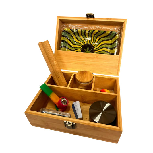 Sparky's small wooden storage box filled with various smoking accessories on a white background