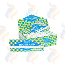 Stack of Original Highland Papers packaging on a white background with decorative elements.